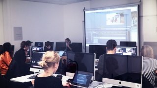Graphic Design Class working in the MacLab